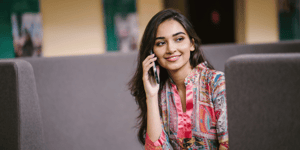 A business woman talking to someone on the phone
