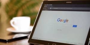 An image of an iPad screen with the Google search home page.